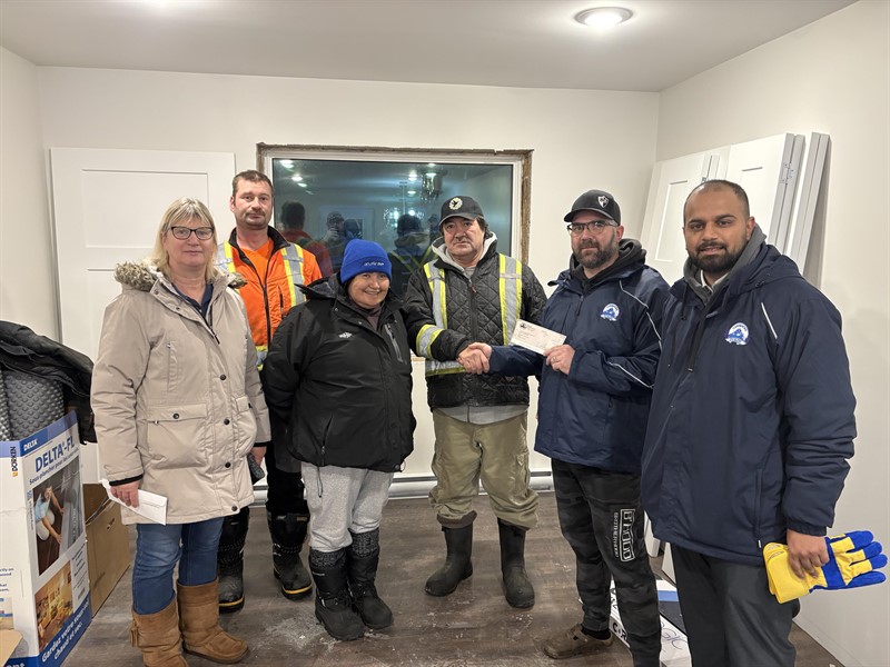 Handing_Cheque_to_Micheal_Sam